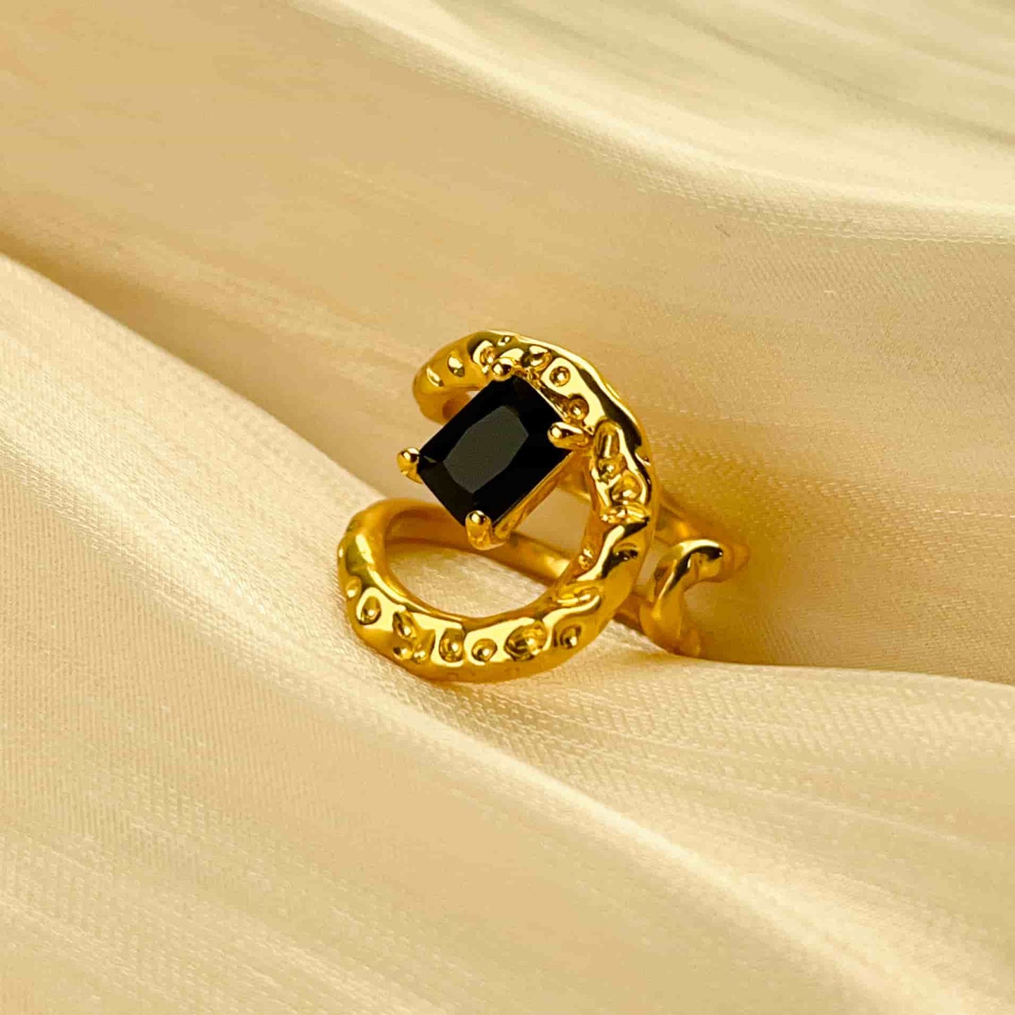 Classic Black and Gold Combination, Absolutely Stunning. Material: Obsidian and copper plated with 18K gold. Weight: 6g Dimensions: approximately #7 (adjustable