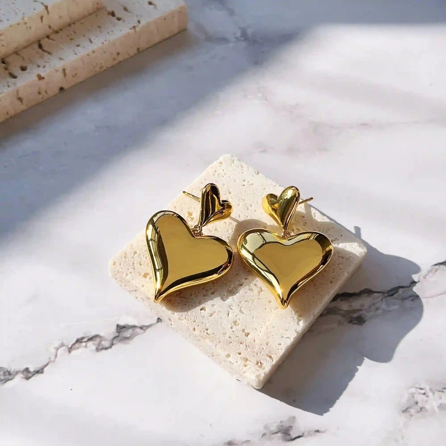 Cute hollow heart shape pendant earrings. Material: S925 silver pins, copper plated with 18K gold. Weight: 18g/pair Dimensions:3.5cm*2.5cm