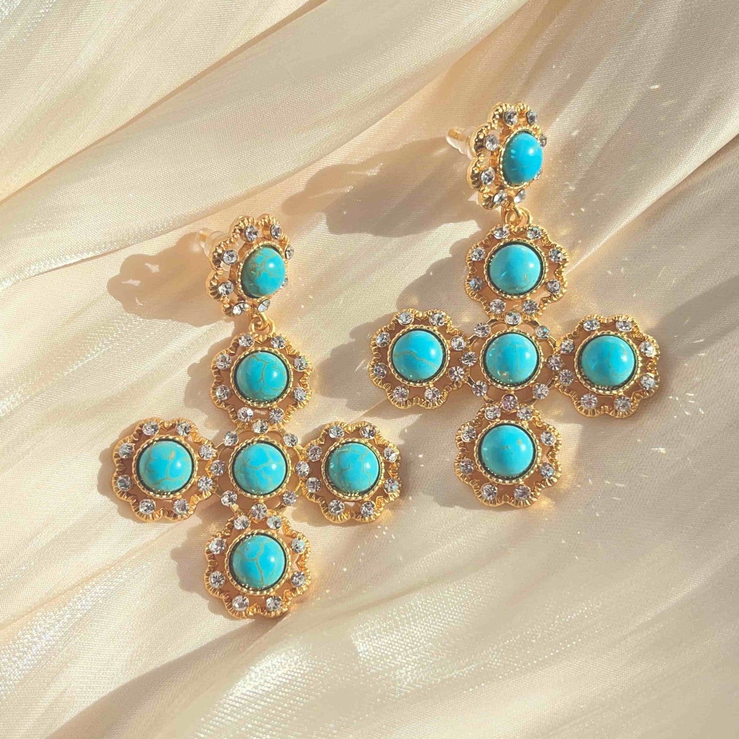 Exquisite Cross Earrings Inlaid with Turquoise and Zirconia. Material:S925 silver pins and copper plated with 18K gold, Turquoise, Zircon Weight:27.3g / pair Dimensions:6.7cm*4.5cm