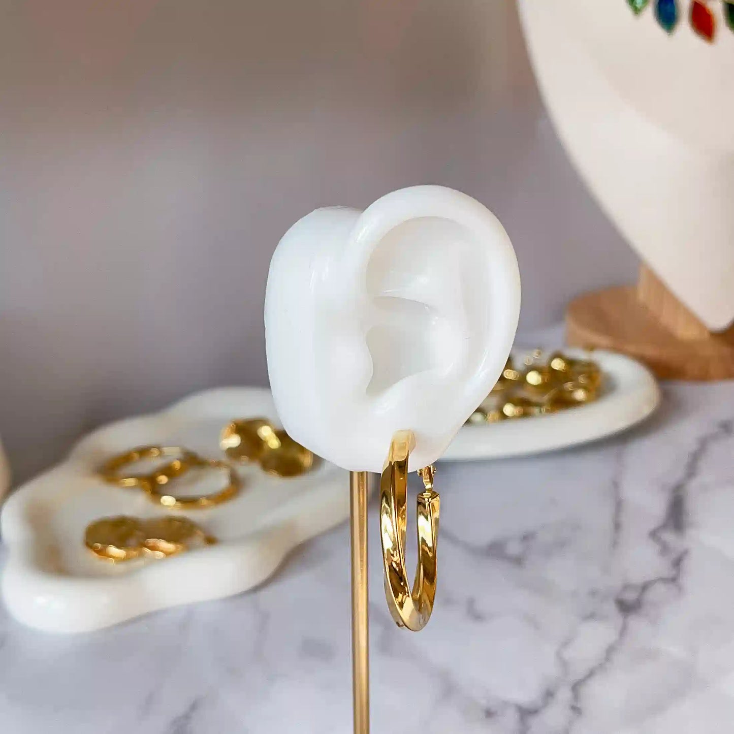 Gold Möbius Loop Earrings. Utilizing hollow technology to make the earrings lighter. 18k Gold Plated, Stainless Steel, Hypoallergenic Material, Waterproof, Tarnish Free