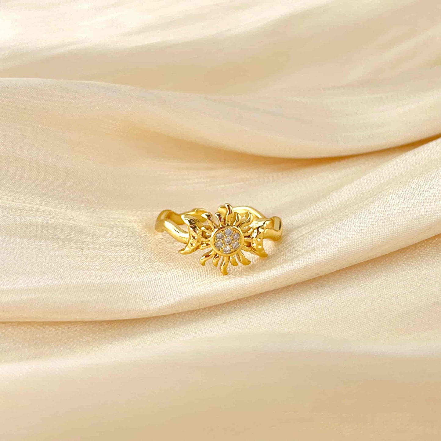 Simple and Sparkling Sun and Moon Ring Inlaid with Zirconia. Material: Zircon and copper plated with 14K gold. Weight: 2.1g Dimensions: approximately #7 (adjustabl