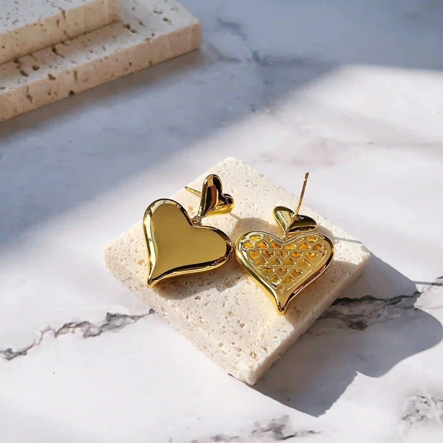 Cute hollow heart shape pendant earrings.  Material: S925 silver pins, copper plated with 18K gold. Weight: 18g/pair Dimensions：3.5cm*2.5cm