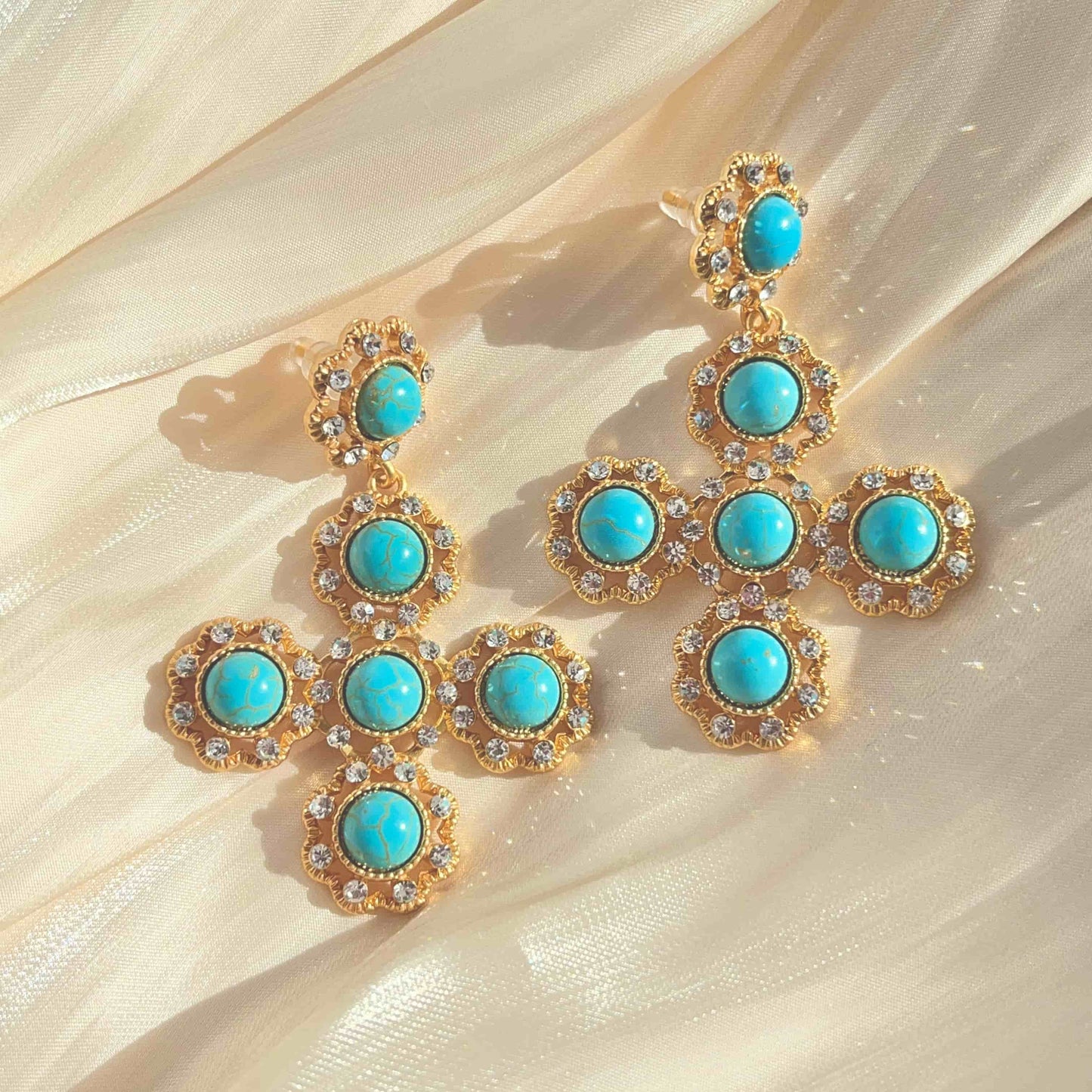 Exquisite Cross Earrings Inlaid with Turquoise and Zirconia.  Material：S925 silver pins and copper plated with 18K gold, Turquoise, Zircon Weight：27.3g / pair Dimensions：6.7cm*4.5cm