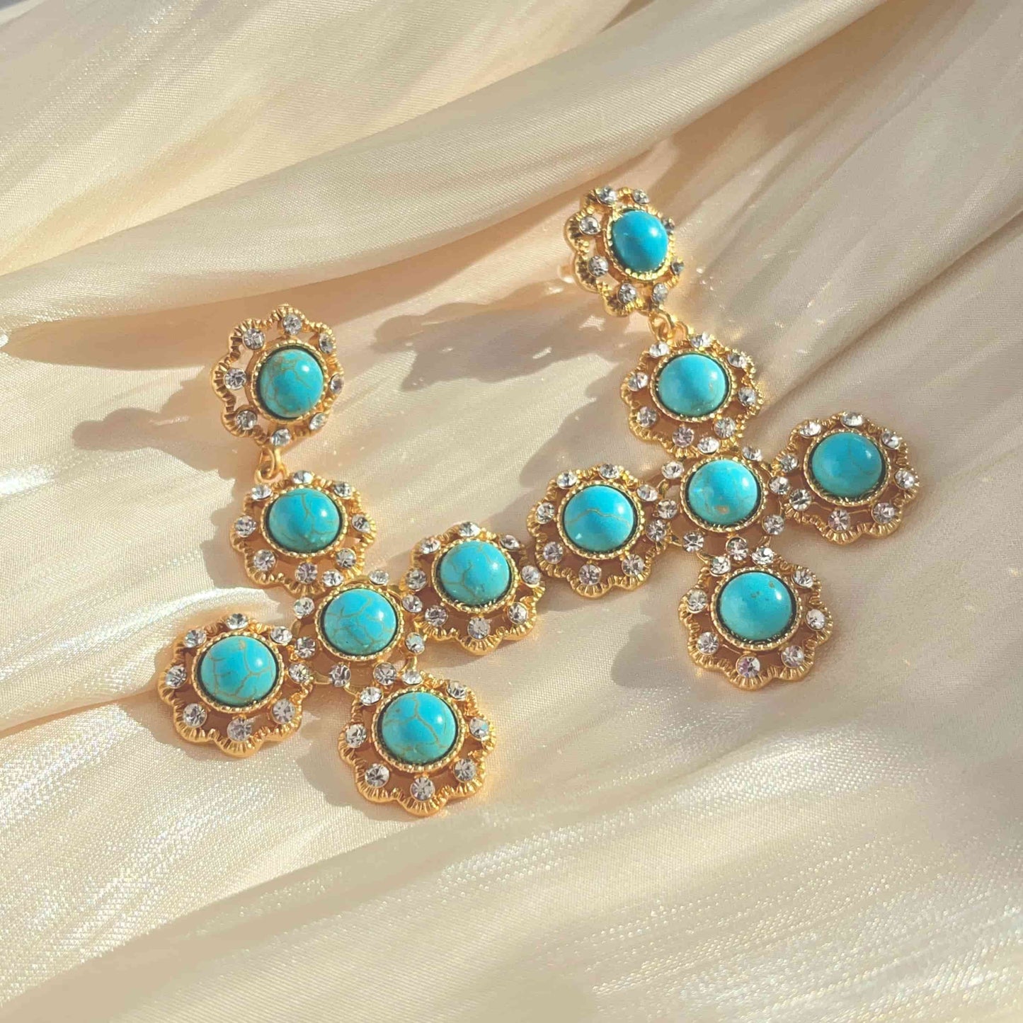 Exquisite Cross Earrings Inlaid with Turquoise and Zirconia.  Material：S925 silver pins and copper plated with 18K gold, Turquoise, Zircon Weight：27.3g / pair Dimensions：6.7cm*4.5cm