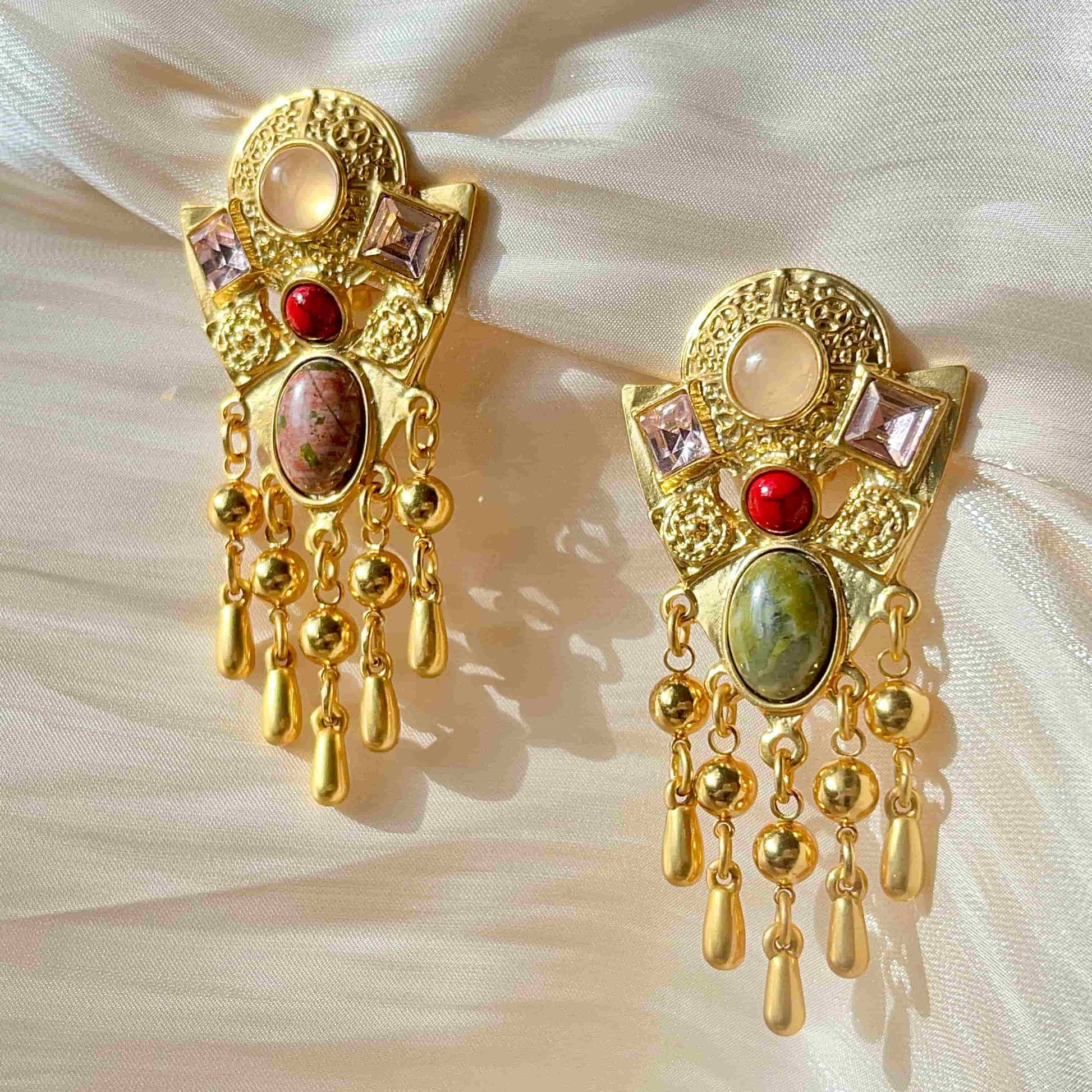 Exquisite Gold Clip-on Pendant Earrings adorned with Unakite, Zircon and natural stone.  Material：Copper plated with 18K gold, Unakite, natural stone, Zircon Weight：37.4g / pair Dimensions：7cm*3.2c