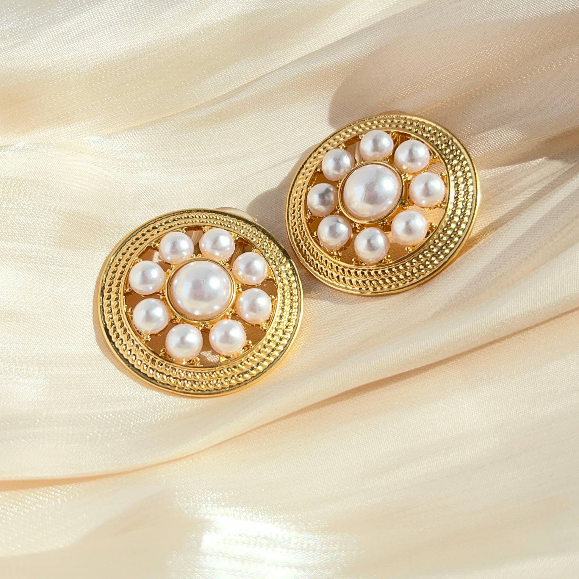 Round Shield-Shaped Hollow Design with Inlaid Mother of Pearl Clip-on Earrings.