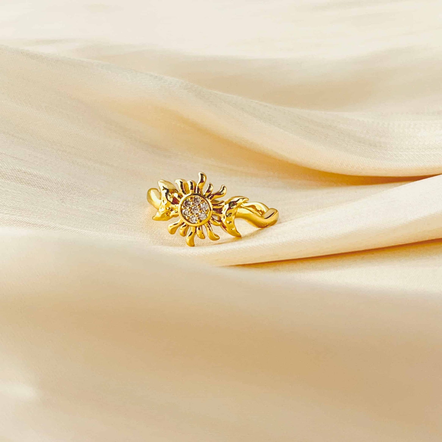 Simple and Sparkling Sun and Moon Ring Inlaid with Zirconia.  Material: Zircon and copper plated with 14K gold. Weight: 2.1g Dimensions: approximately #7 (adjustabl